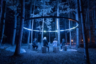 A group observing a light show in Wendake, Quebec